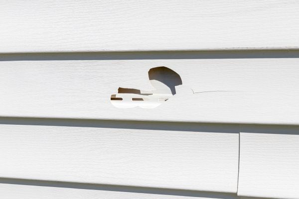 White Vinyl Siding Repair in Oakland